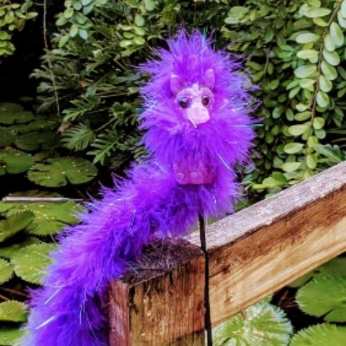 purple dragon puppet with real movement