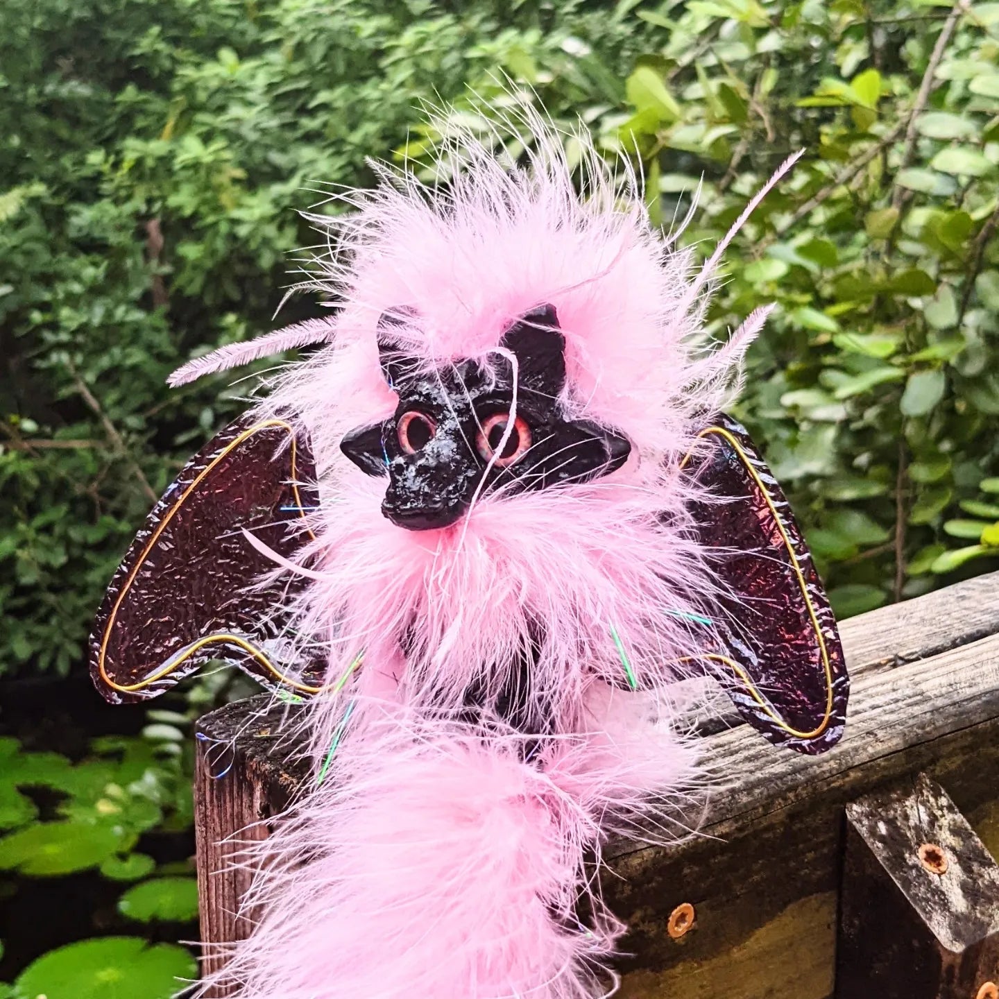 pink baby dragon with black wings for renaissance cosplay